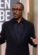 How is Eddie Murphy now related to Martin Lawrence?
