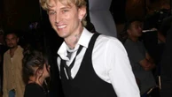 Machine Gun Kelly leaves American Music Awards early because baby daughter has a 'fever'
