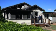 breakingMother charged with murder over fire that killed her kids