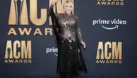 Dolly Parton thinks late husband Carl Dean would want her to keep going after his death