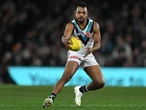 Rioli threats saga no distraction as Cats face Giants