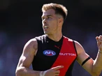 Essendon hold off fast-finishing Swans challenge