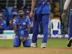 Gujarat survive showers in Mumbai to move top of IPL