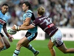 Sharks shine early and late to add to Manly's woes