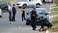 Horror as bullets spray home with kids inside
