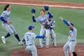 Base-ball : les Los Angeles Dodgers conservent leur titre au terme d’une finale exceptionnelle face aux Toronto Blue Jays