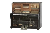 AI music is reviving the same fights that shaped the player piano