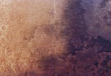 Mars orbiter watches mysterious wave of darkness spread across red planet’s surface