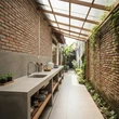 6 Solusi Desain Dapur Terbuka di Gang Sempit dengan Atap Fiber dan Meja Semen