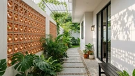 Inspirasi Koridor Samping Rumah dengan Dinding Roster yang Bikin Rumah Lebih Sejuk dan Est...