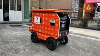 Laporan Liputan6.com dari Tokyo: Uji Coba Robot Pengiriman Suzuki Jadi Langkah Nyata Menuj...
