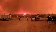 Workers survive Ont. wildfire by hiding in shipping container