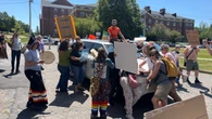 Protesters surround car, smash glass following Tim Houston speech