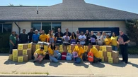 Cambridge temple helps local police collect backpacks for children in need