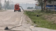 Firefighting equipment being removed from Fort Providence, N.W.T., as part of staged re-entry