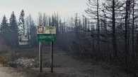 Phone lines down in Adam's Cove days after raging wildfire