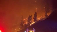 Wildfire near Peachland being held after tactical evacuation, Highway 97 closure