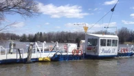 Driver escapes sinking car after Tesla falls off ferry near Montreal