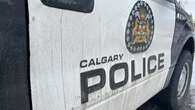 Calgary police arrest three people at protest in downtown Calgary