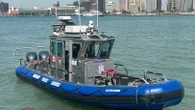 2 boaters plucked from water after boat flips over near Peche Island