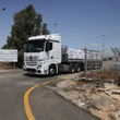 Israel to 'control all parts' of Gaza, Netanyahu says, as aid trucks wait to enter territory