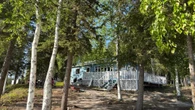 Owner of lodge on N.W.T.'s Watta Lake worries about fire burning 4 kms away