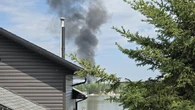Evacuation order still in effect as officials assess damage from wildfire northwest of Edmonton