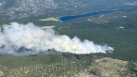 Wildfire sparks East Kootenay evacuation alert, weather helps firefight near Boston Bar
