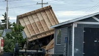Tornado touches down in northwestern Alberta village, damaging homes and businesses