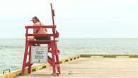 Lifeguards at P.E.I.'s Basin Head kept on their toes as wind and moon forge strong currents