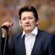 Crowds line Dublin streets for funeral procession of Pogues singer Shane MacGowan