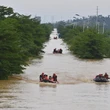 Taiwan braces for powerful typhoon after floods in China kill dozens