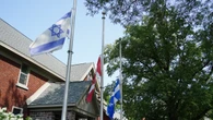 Man arrested after Israeli flag outside Hampstead, Que. town hall set on fire