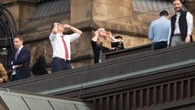 MPs with eclipse glasses stare at 'surreal' celestial event on Parliament Hill