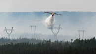 Water bombers back in the sky to fight Kingston fire thanks to favourable conditions