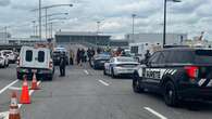 Protesters glue themselves to road near Montreal airport in action to 'end oil'