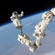 Astronauts are doing a space walk to repair robotic arm on the ISS