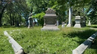 Workers at Notre-Dame-des-Neiges cemetery say grass is unkempt, bones unearthed due to job cuts
