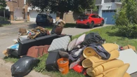 'Don't take that. It's contaminated,' post-storm scavengers warned