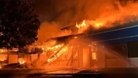 Frustrated Port Coquitlam families to rally over slow rebuild of burned-down school