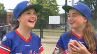 Girls play baseball at this Montreal park. The city wants to turn it into a library