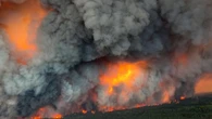 Crews focus on defence as several Prairie wildfires merge