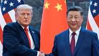 Weakened Trump in China for high stakes talks with Xi