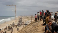 Palestinians returning to homes in Gaza, IDF pulling back to ceasefire line