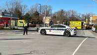 Bystanders rescue injured people caught beneath car after it struck a bus shelter in Longueuil, Que.