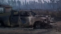 Wildfires gut Saskatchewan towns: ‘It looks like a war zone’