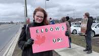 Protest against Elon Musk held outside of Tesla dealership in Kitchener