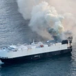 22 crew members rescued from lifeboat in North Pacific after cargo ship carrying 3,000 vehicles catches fire