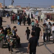Palestinians say 5 killed by Israeli fire near aid sites. Israel says it fired warning shots