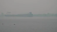 Northwestern Ontario wildfires contribute to eerie haze along Sault Ste. Marie waterfront